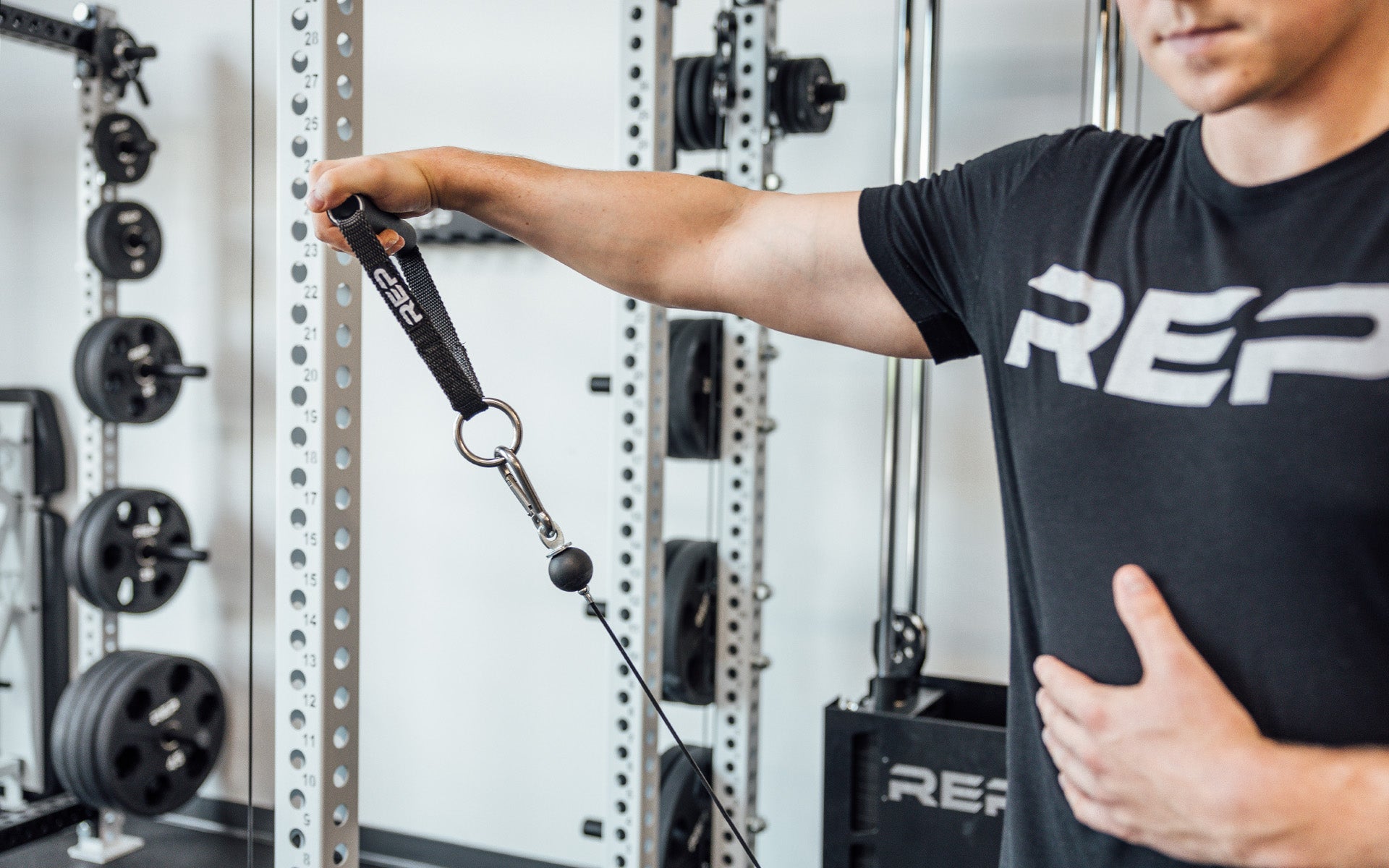 D-handle being used for cable side raise