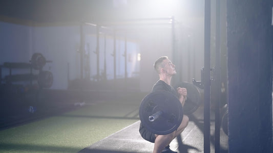 Why Everyone Should Be Doing Zercher Squats, According to A Trainer